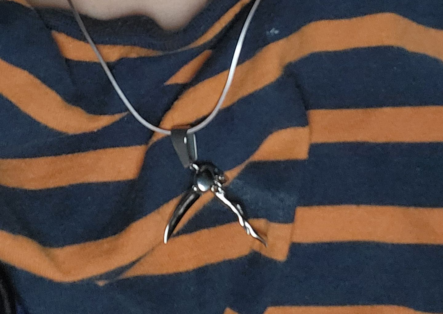 Customer photo review of SCYTHE SKULL PENDANT