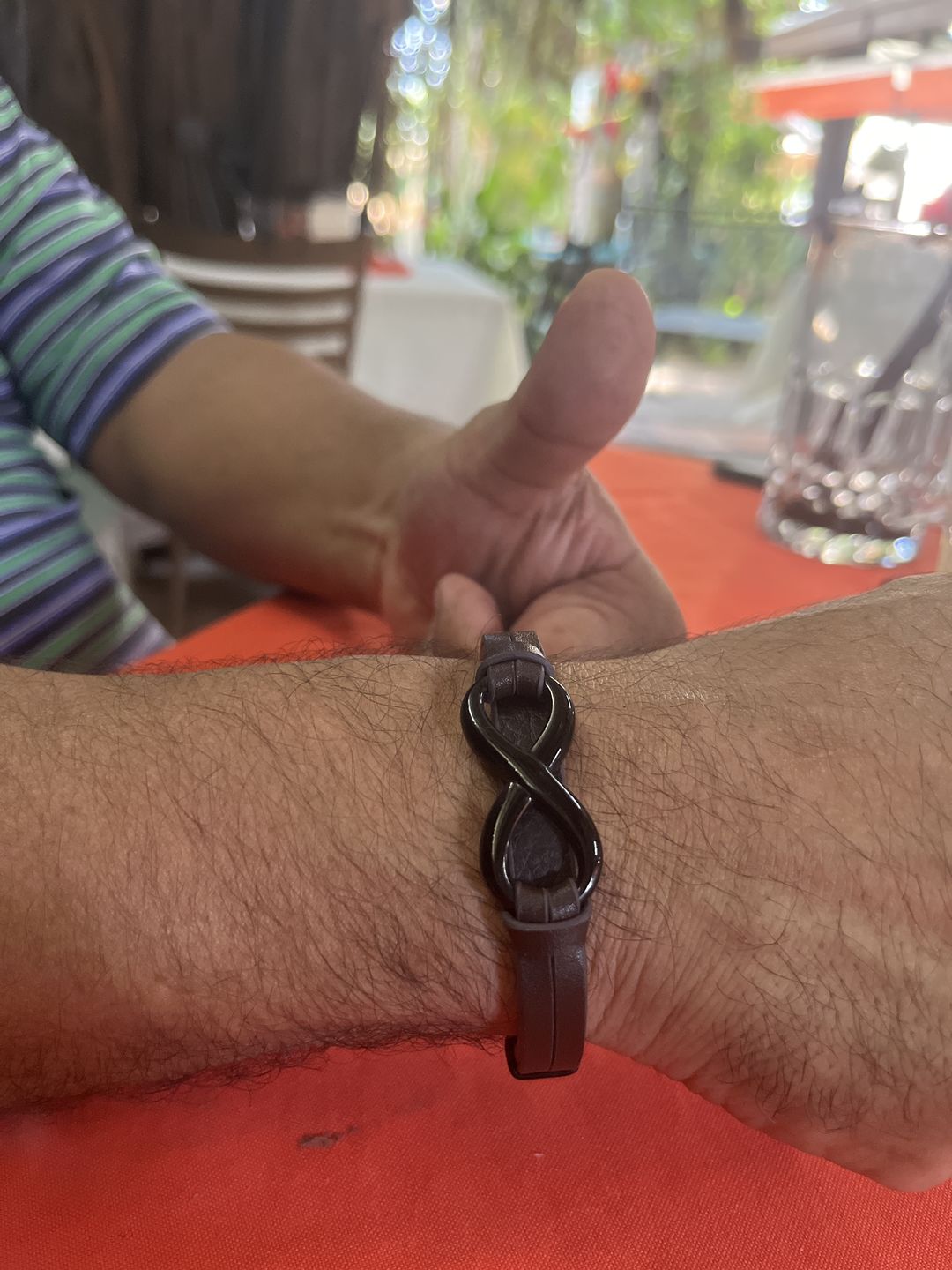 Customer photo review of Pulsera Infinito - Piel Natural