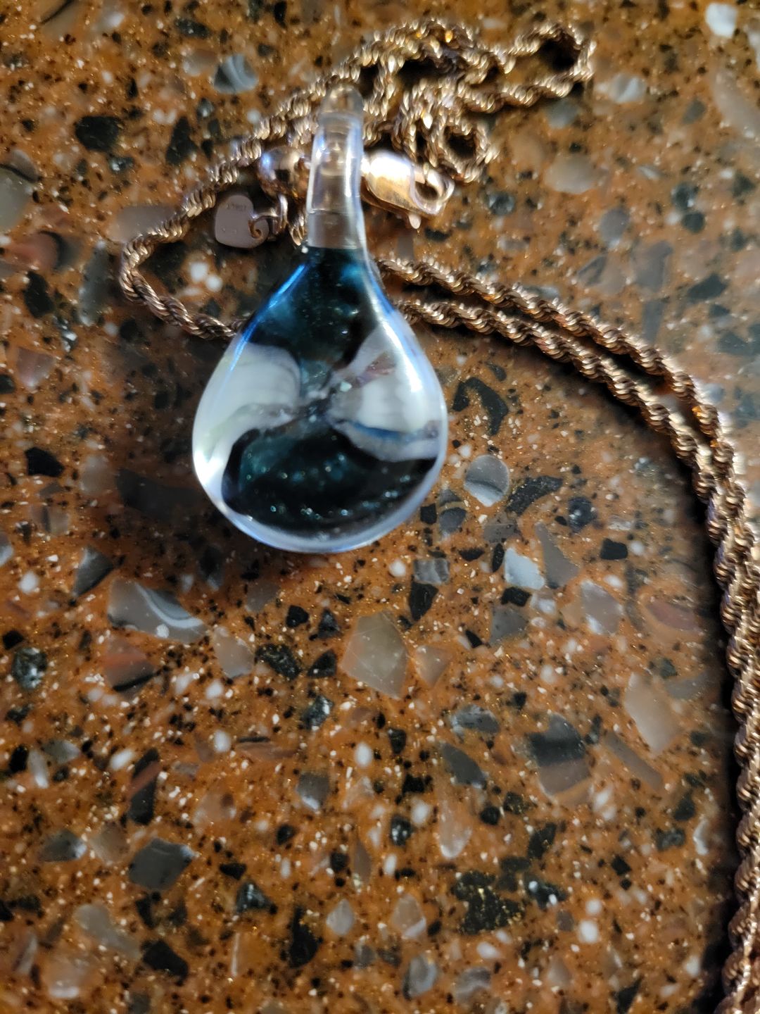 Customer photo review of Ocean Crash Pendant with Infused Cremation Ashes