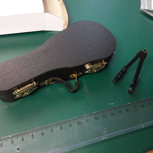 Customer photo review of Miniature Guitar Musical Instrument Figure