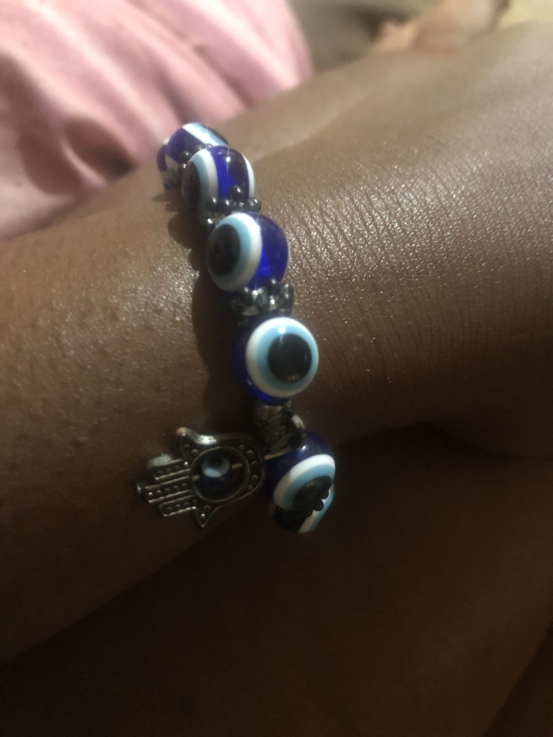 Customer photo review of Blue Hamsa Hand Evil Eye Bracelet