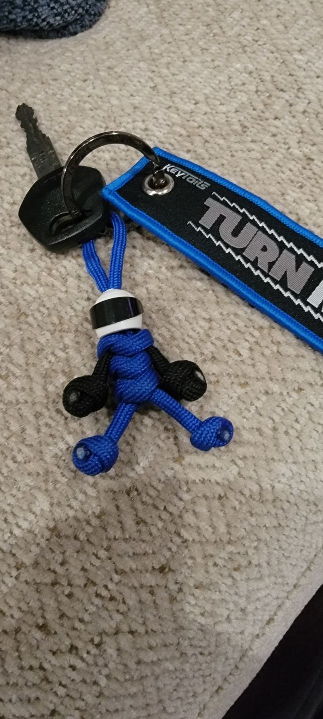 Customer photo review of Blue Biker Buddy Paracord Keychain