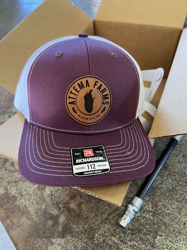Customer photo review of Custom Leather Patch Trucker Hat - Richardson 112