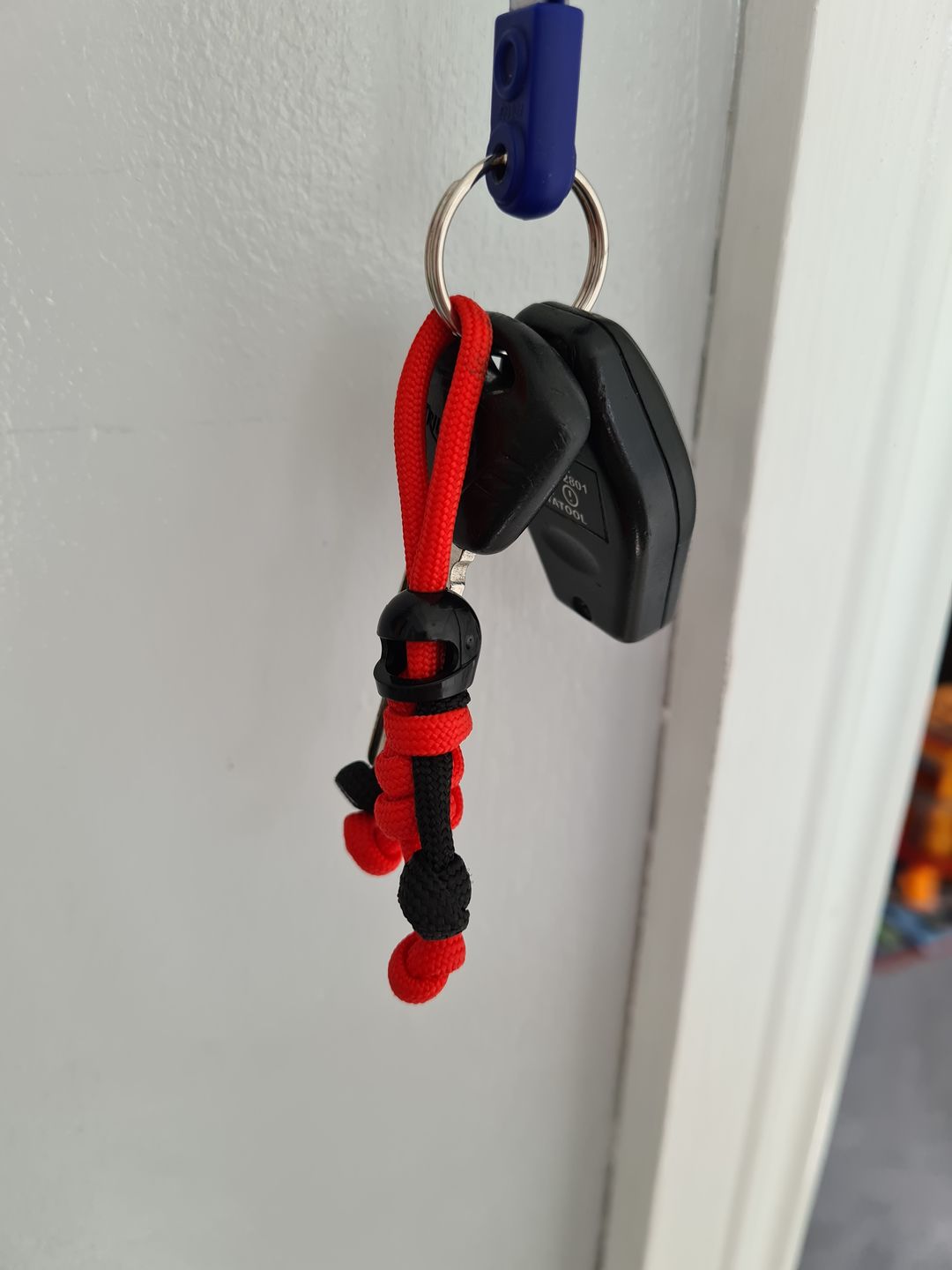 Customer photo review of Black Red Biker Buddy Paracord Keychain