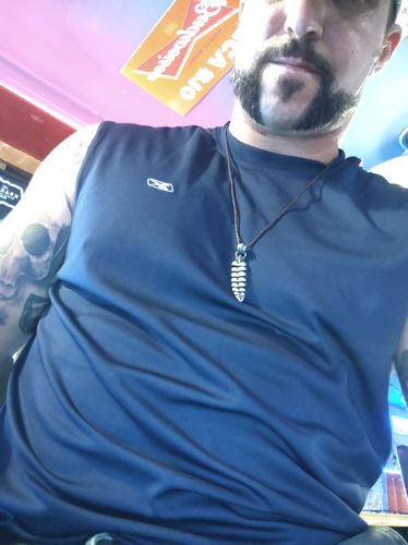 Customer photo review of Brass Rattlesnake Tail Pendant