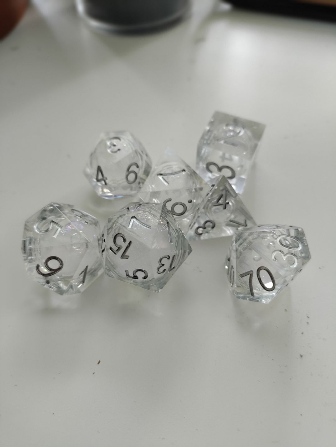 Customer photo review of URWizards D&D Starry Liquid Heart Resin Engraved Dice Set Ice Cube
