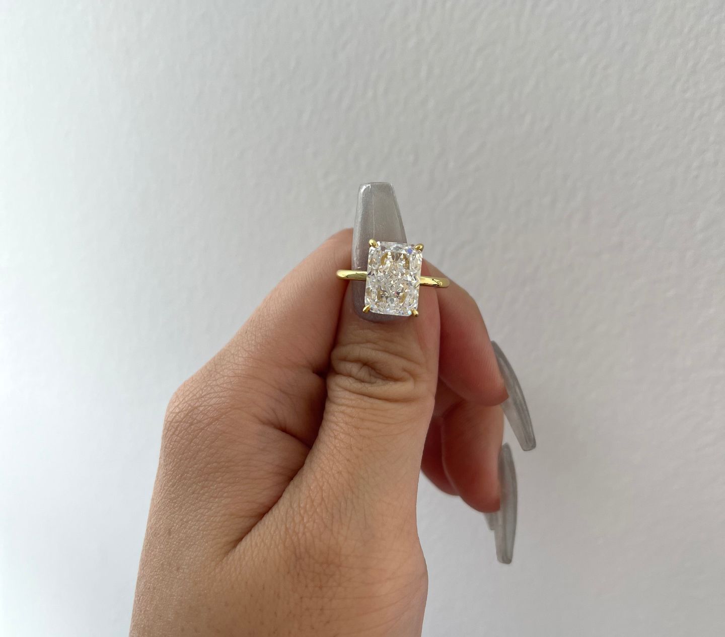 Customer photo review of S925 Classic 4.5 Carat Radiant Cut Simulated Diamond Engagement Ring/Wedding Set