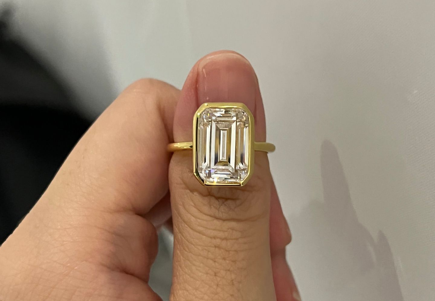 Customer photo review of Louily Unique Yellow Gold Emerald Cut Bezel Engagement Ring In Sterling Silver