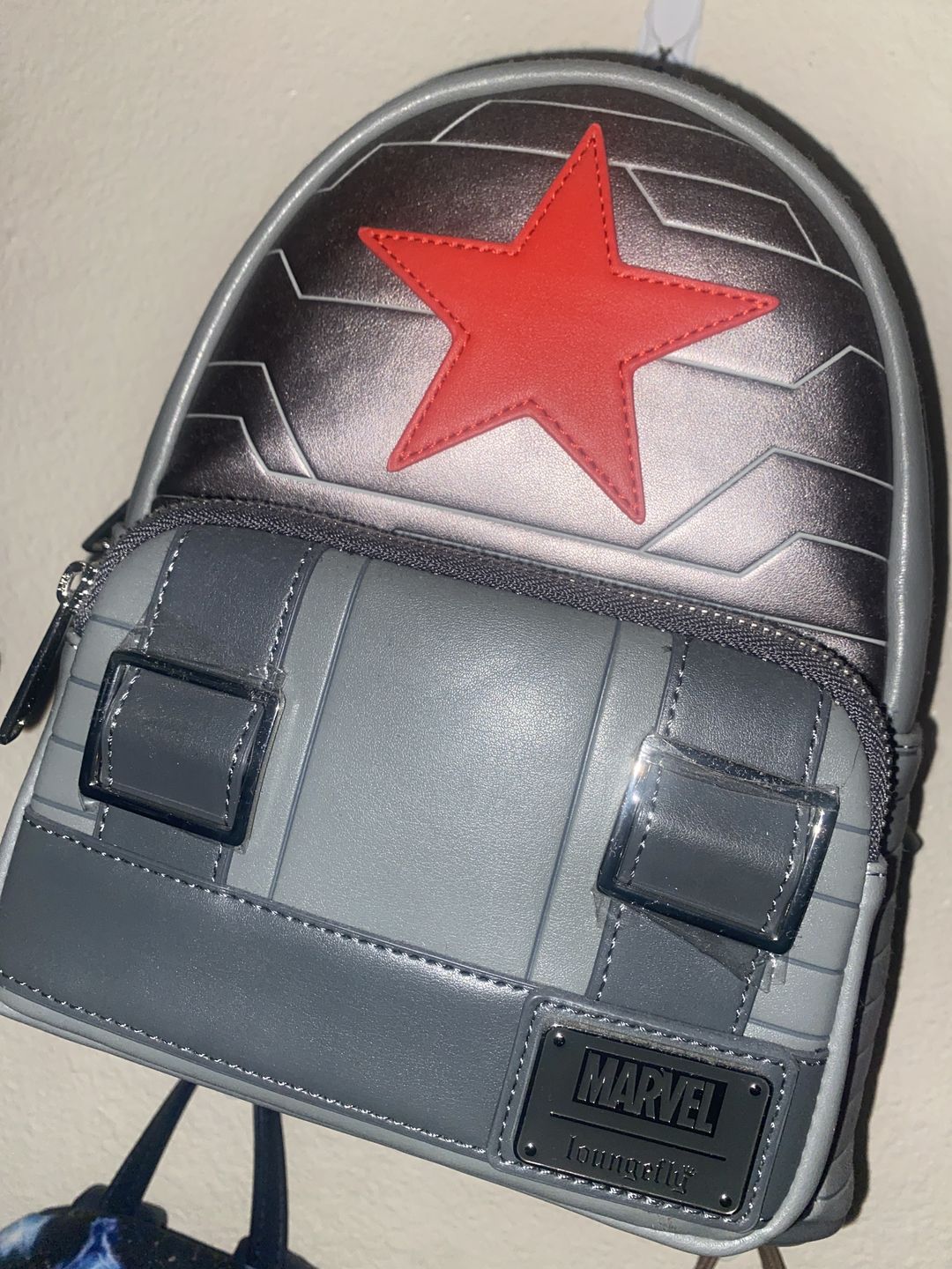 Customer photo review of Loungefly Marvel Winter Soldier Cosplay Mini Backpack