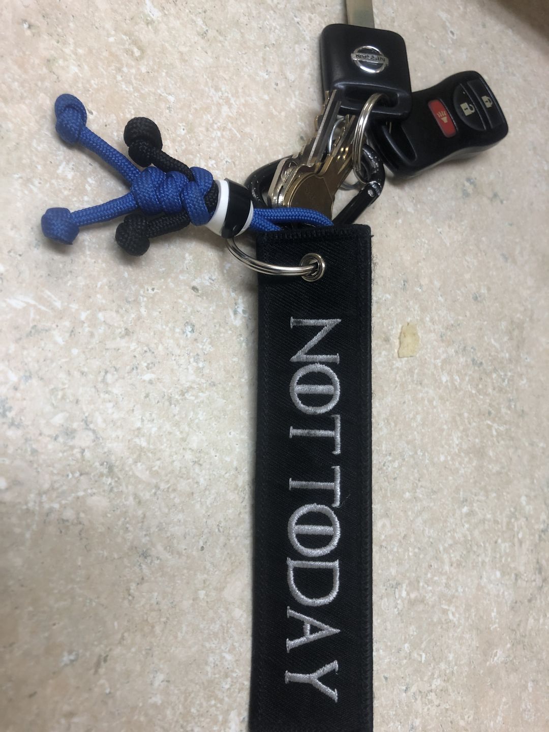 Customer photo review of Blue Biker Buddy Paracord Keychain