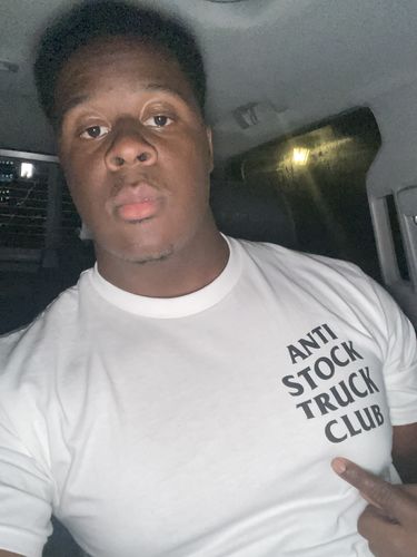 Customer photo review of Anti Stock Truck Club Tee