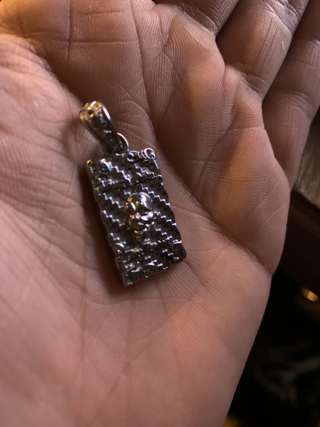 Customer photo review of LAUGH NOW, DIE LATER PENDANT