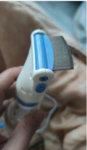 Customer photo review of Brosse électrique anti-poux + 10 filtres offerts