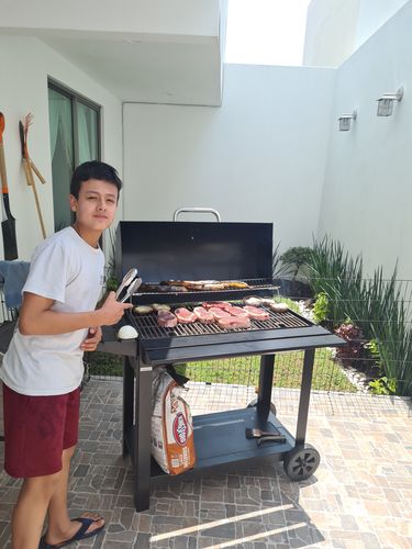 Reseña con foto de un cliente sobre New York Steak