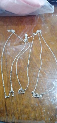 Customer photo review of Zodiac Sign Necklace Set - 3 Pieces