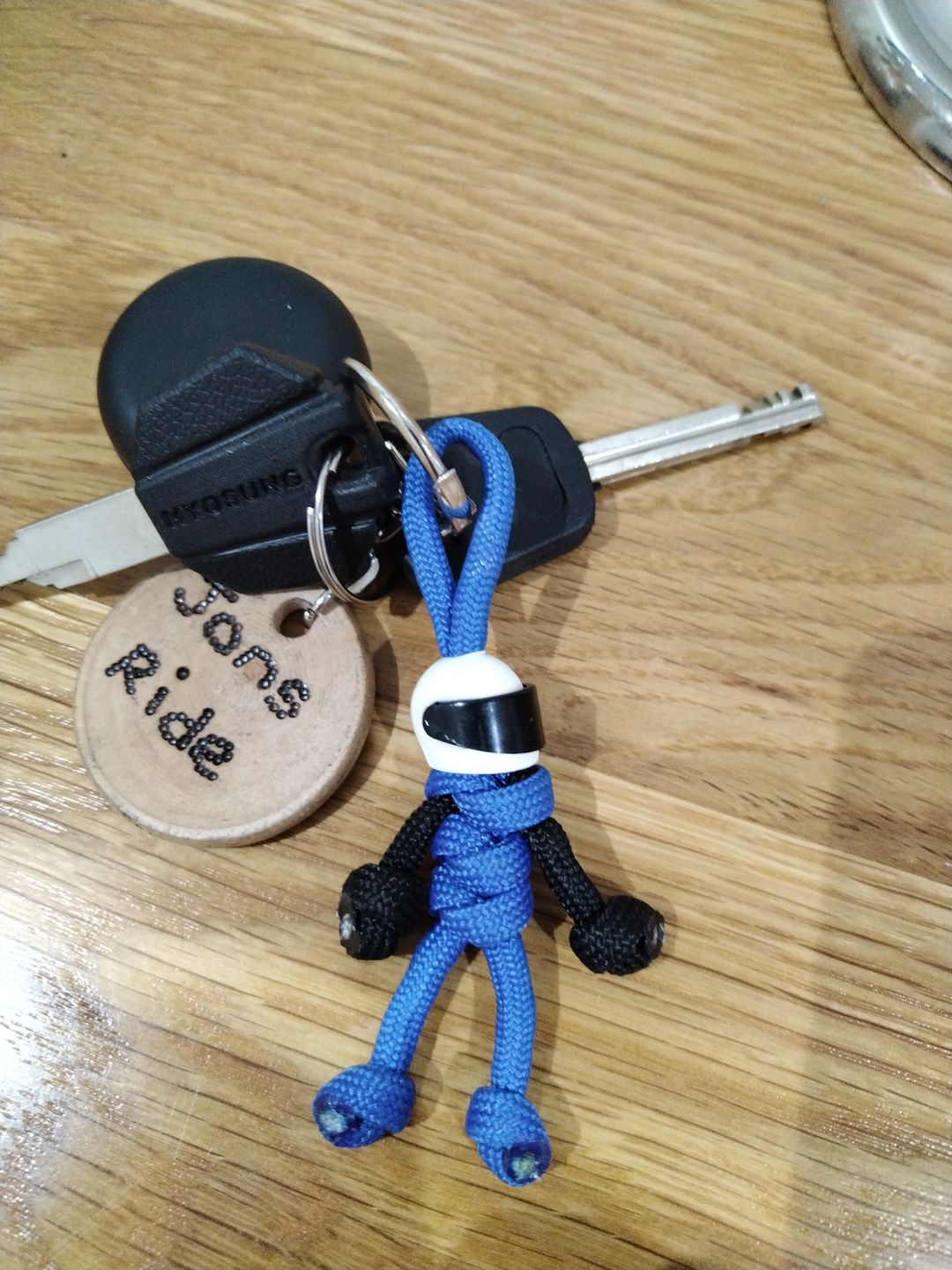 Customer photo review of Blue Biker Buddy Paracord Keychain