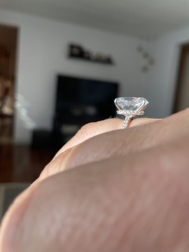 Customer photo review of Solitaire Hidden Halo 5.5ct Oval CZ Ring in Sterling Silver