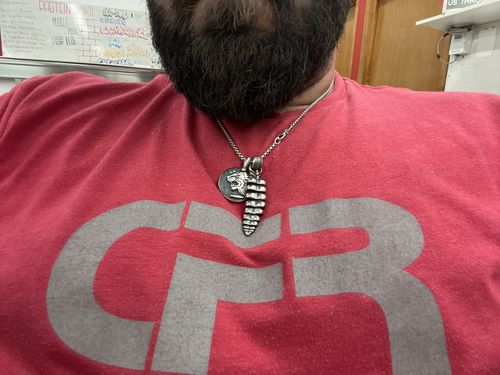 Customer photo review of Brass Rattlesnake Tail Pendant