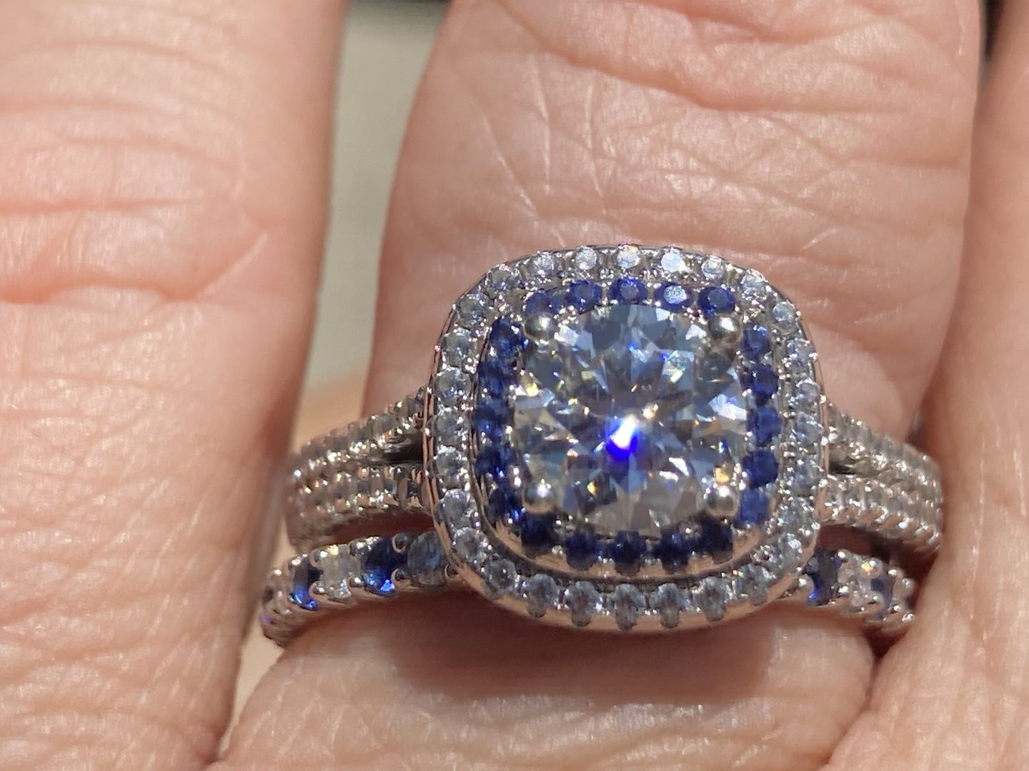 Customer photo review of Alternating Moissanite And Sapphire Eternity Wedding Band Ring