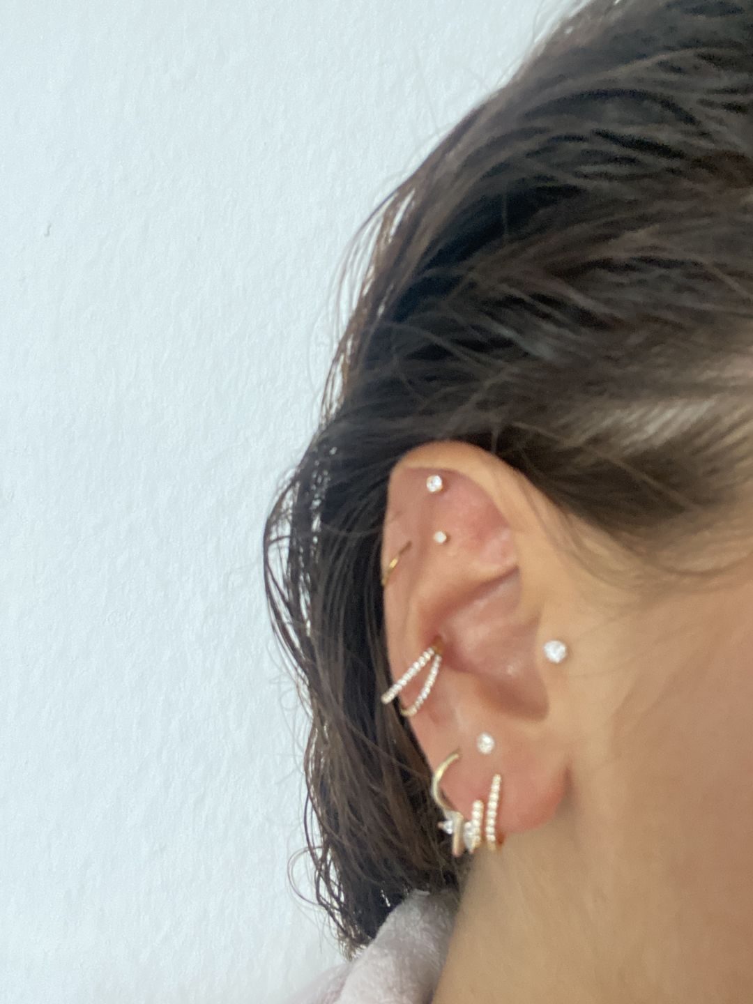 Customer photo review of Double Clicker Piercing | Titan