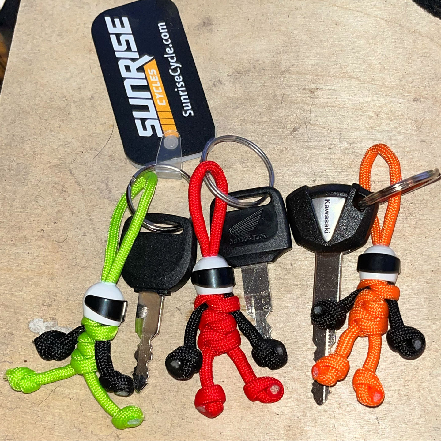 Customer photo review of Orange Biker Buddy Paracord Keychain