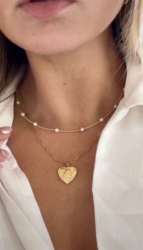 Customer photo review of cherub necklace