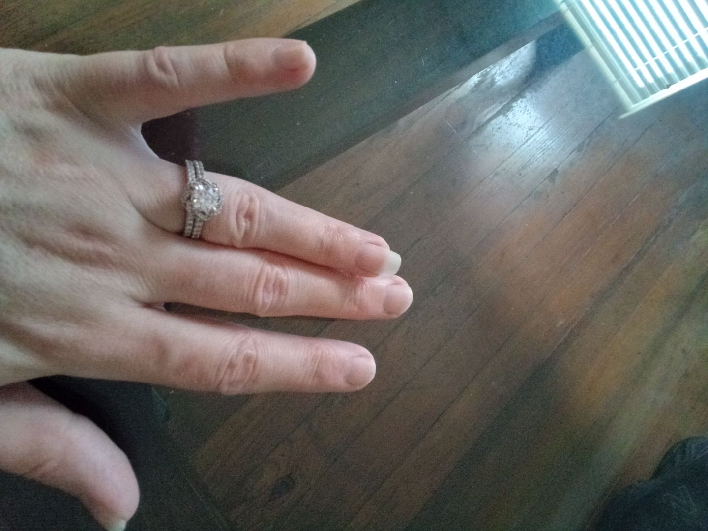 Customer photo review of Moissanite Round Half Eternity Sterling Silver Wedding Band Stackable Ring