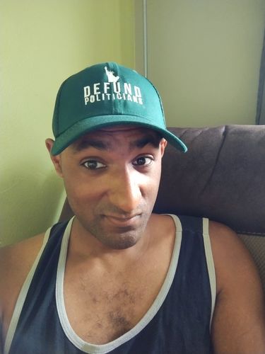 Customer photo review of Defund Politicians Liberty Flex Fit Hat