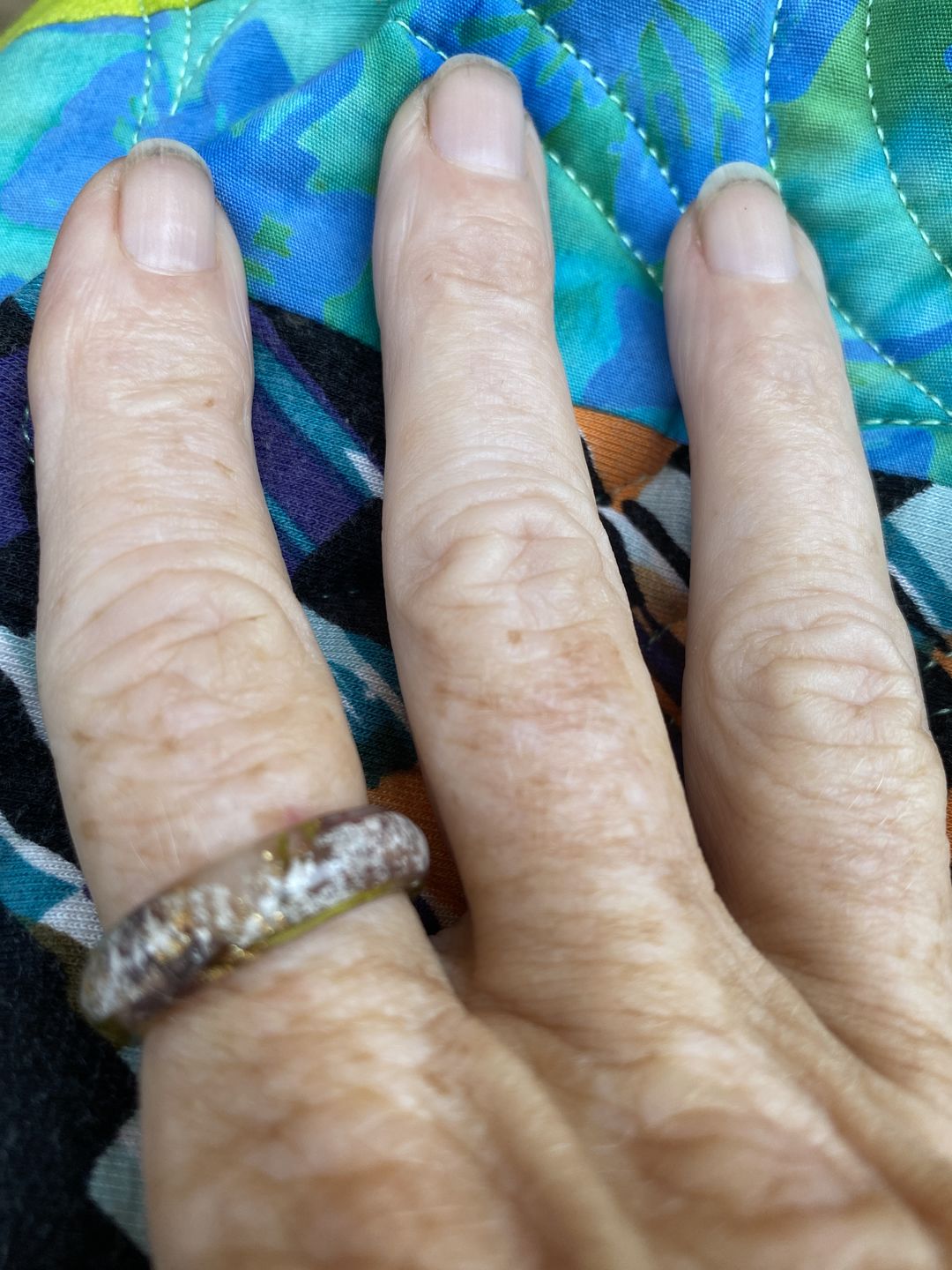 Customer photo review of Red Rose Moss Ring with Cremation Ash and Gold Flakes