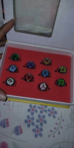 Customer photo review of 10PCS Naruto Akatsuki Sharingan Rings Set Anime Itachi Action Figure Cosplay Metal Jewerly Accessory Children Kids Stuff Gifts