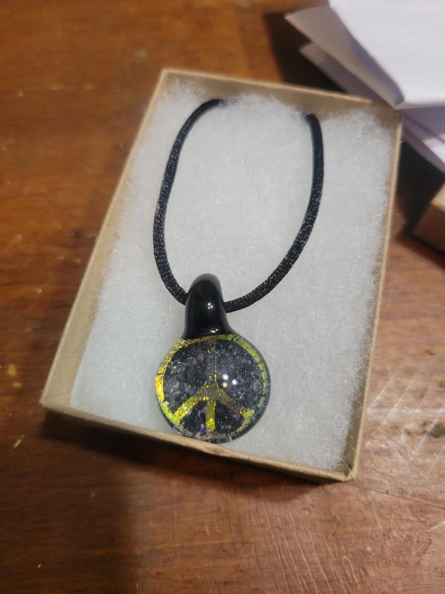 Customer photo review of Peace Sign Hologram Pendant with Infused Cremation Ash