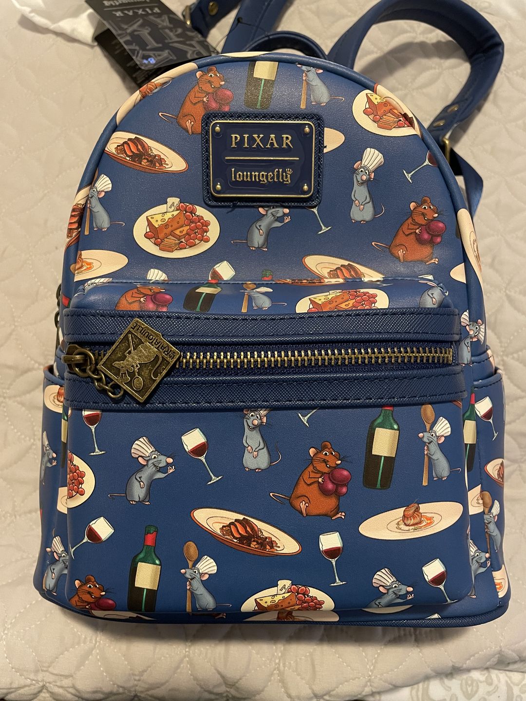 Customer photo review of 707 Street Exclusive -  Loungefly Disney Pixar Ratatouille Remy and Emile Allover Print Mini Backpack