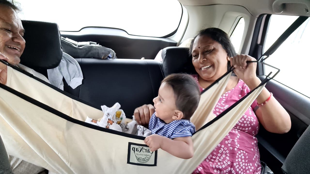 Customer photo review of CarNap - Portable Car Hammock for 0 to 2.5 year baby | with Adjustble Belt, Hammock Cloth, Hangers and Carry Bag