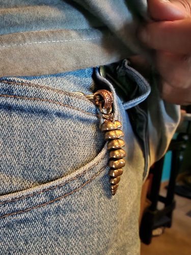 Customer photo review of Brass Rattlesnake Tail Pendant