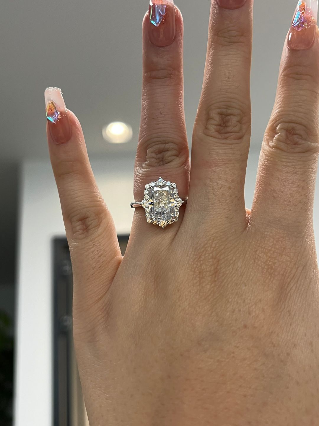 Customer photo review of 8 Ct Louily Luxurious Three Stone Radiant Cut Wedding Set In Sterling Silver