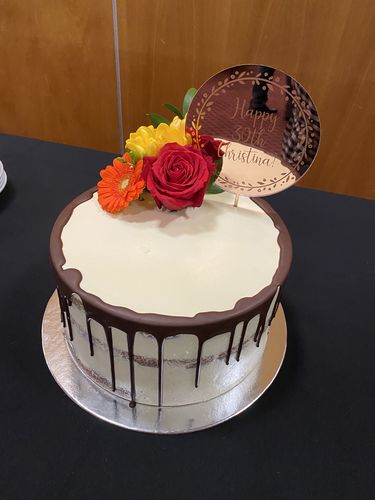 Customer photo review of Floral Personalised Cake Topper (other colours available)