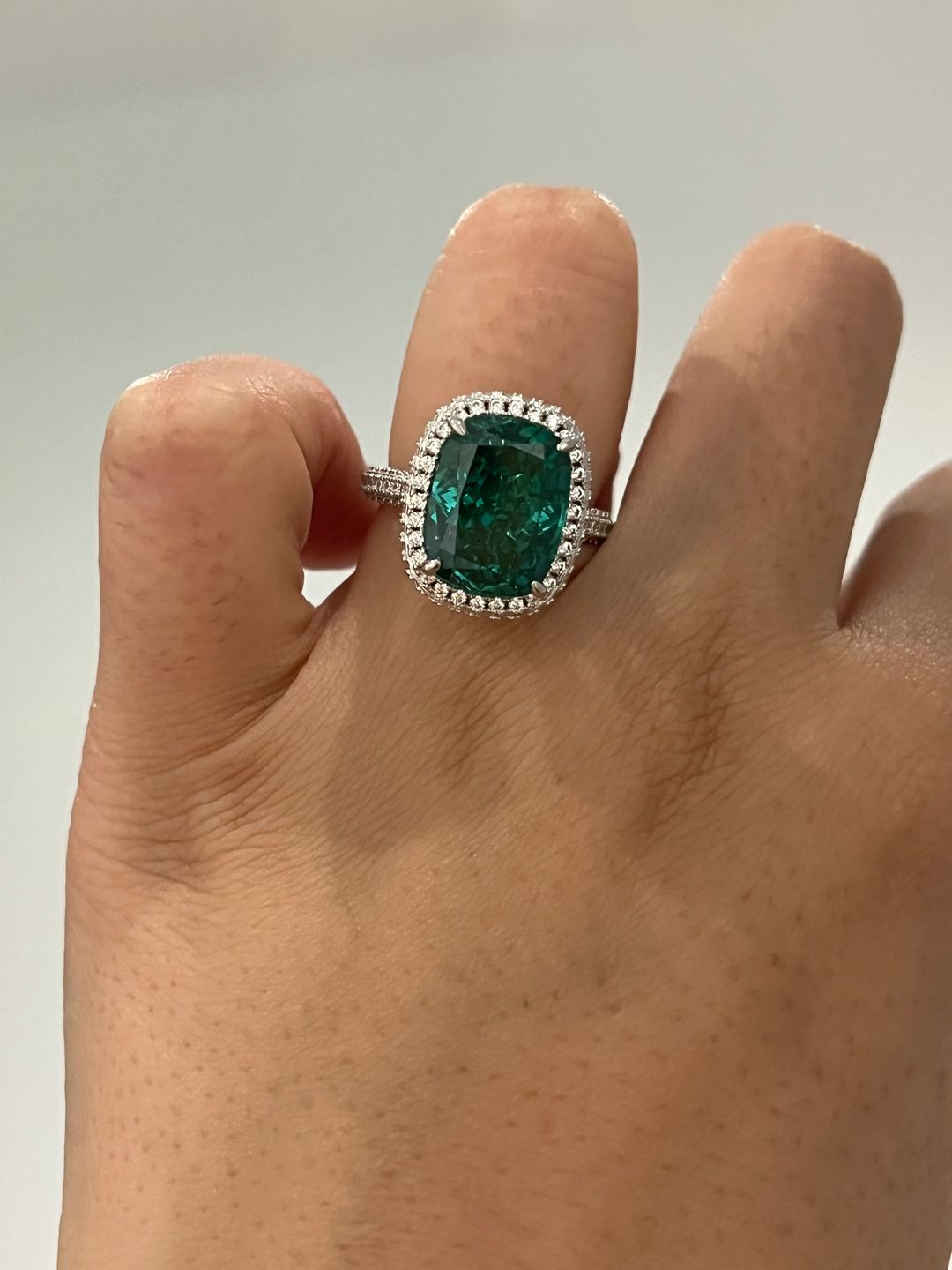 Customer photo review of Louily Gorgeous Halo Cushion Cut Paraiba Tourmaline Engagement Ring In Sterling Silver