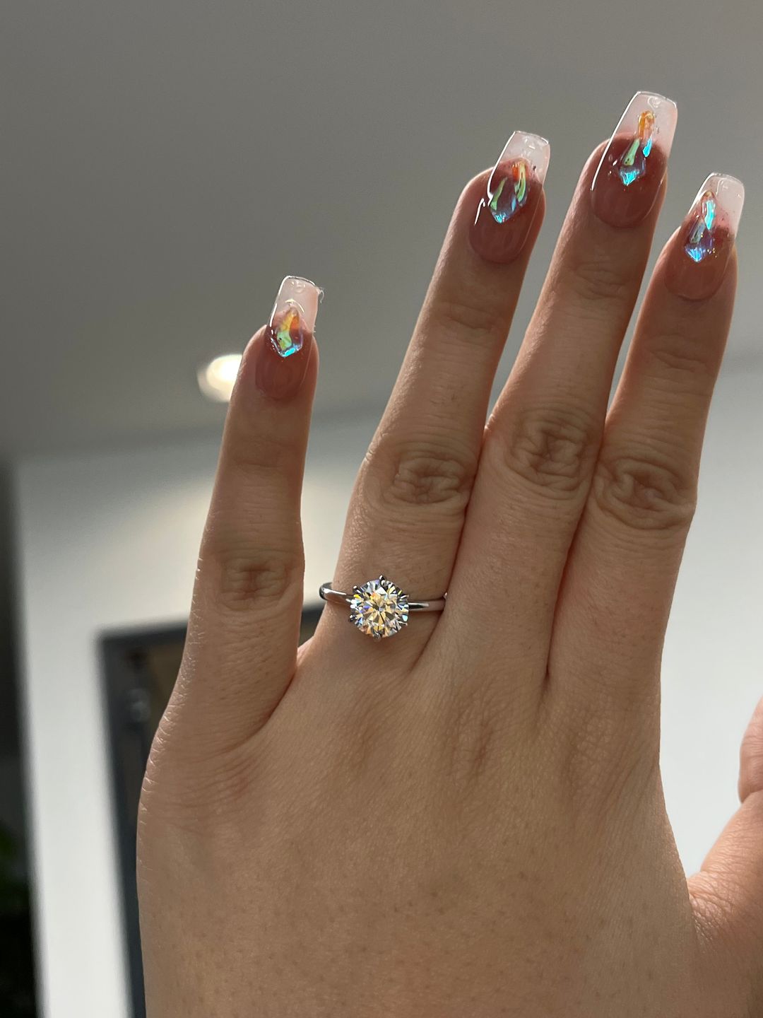 Customer photo review of S925 Moissanite/ Simulated Diamond 2.0 Carat Round Cut Solitaire Engagement Ring In Sterling Silver
