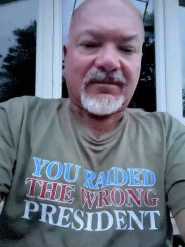 Customer photo review of You Raided The Wrong President Men's Apparel