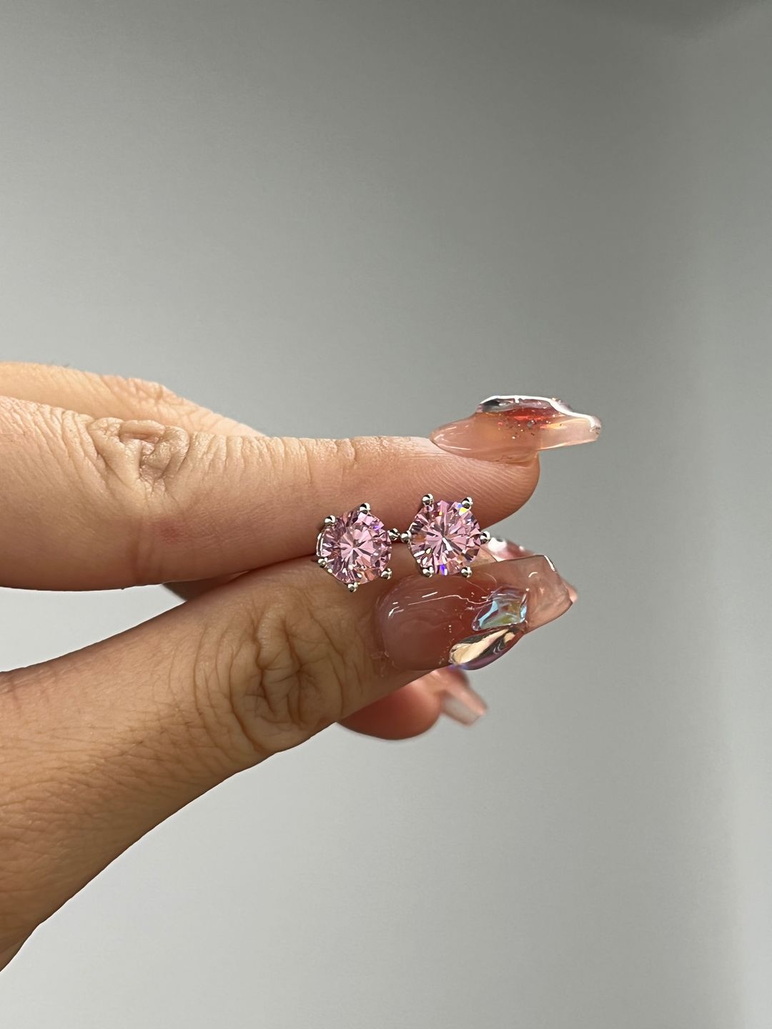 Customer photo review of 2.0 Carat Round Cut Pink Sapphire Stud Earrings In Sterling Silver