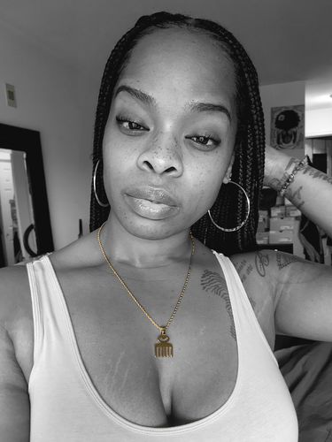 Customer photo review of Duafe Adinkra Necklace