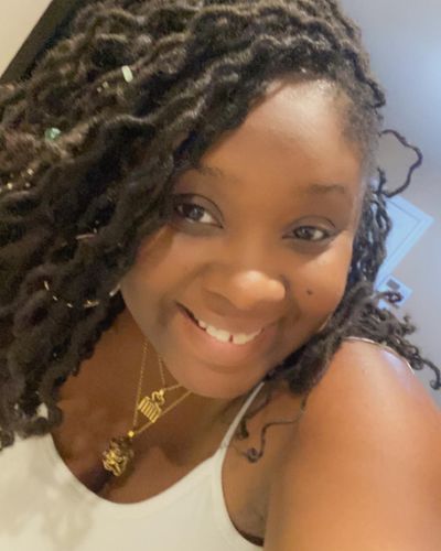 Customer photo review of Duafe Adinkra Necklace