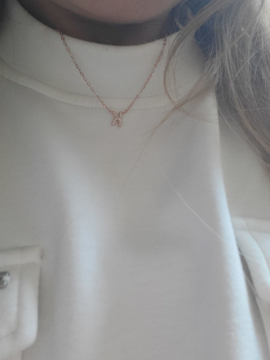 Customer photo review of The Original Initial Sapphire Letter Necklace