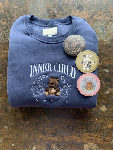 Customer photo review of Inner Child Crewneck Sweater