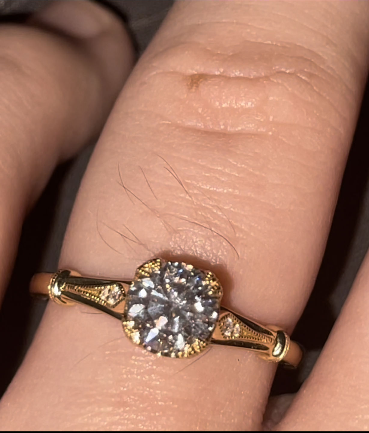 Customer photo review of Doveggs round vintage moissanite engagement ring