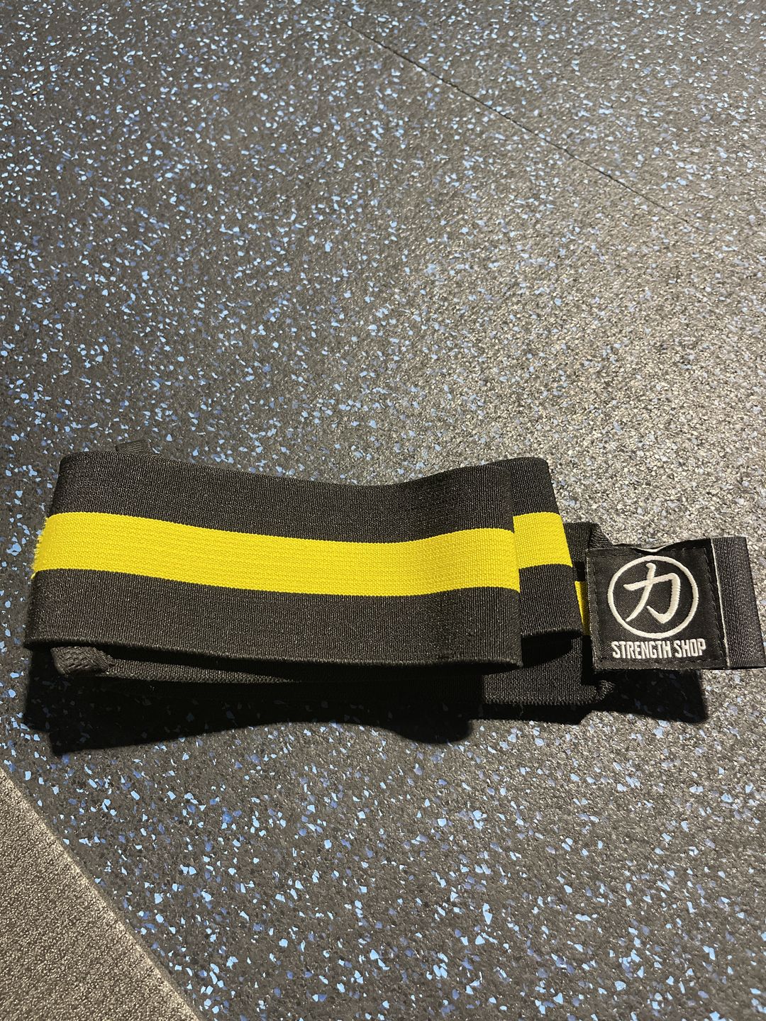 Customer photo review of Strength Shop Super Stiff Wrist Wraps - Black/Yellow - IPF Approved