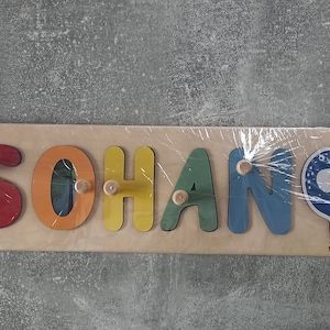 Customer photo review of Boy Dinosaur Name Puzzle