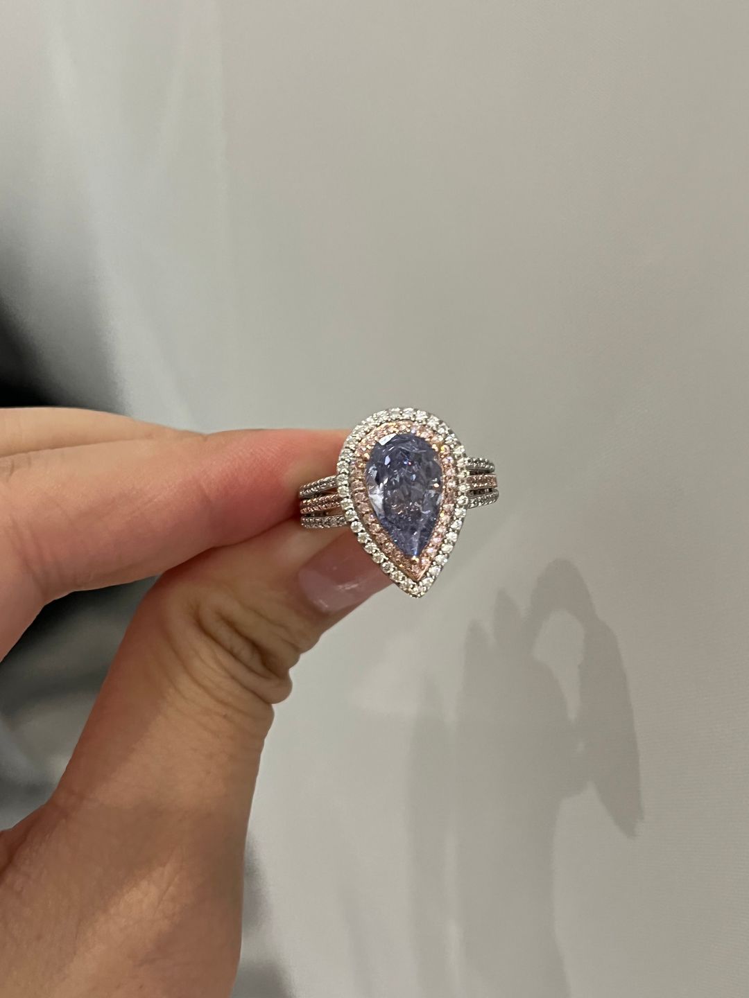 Customer photo review of Louily Luxurious Double Halo Pear Cut Aquamarine Blue/Purple Engagement Ring In Sterling Silver
