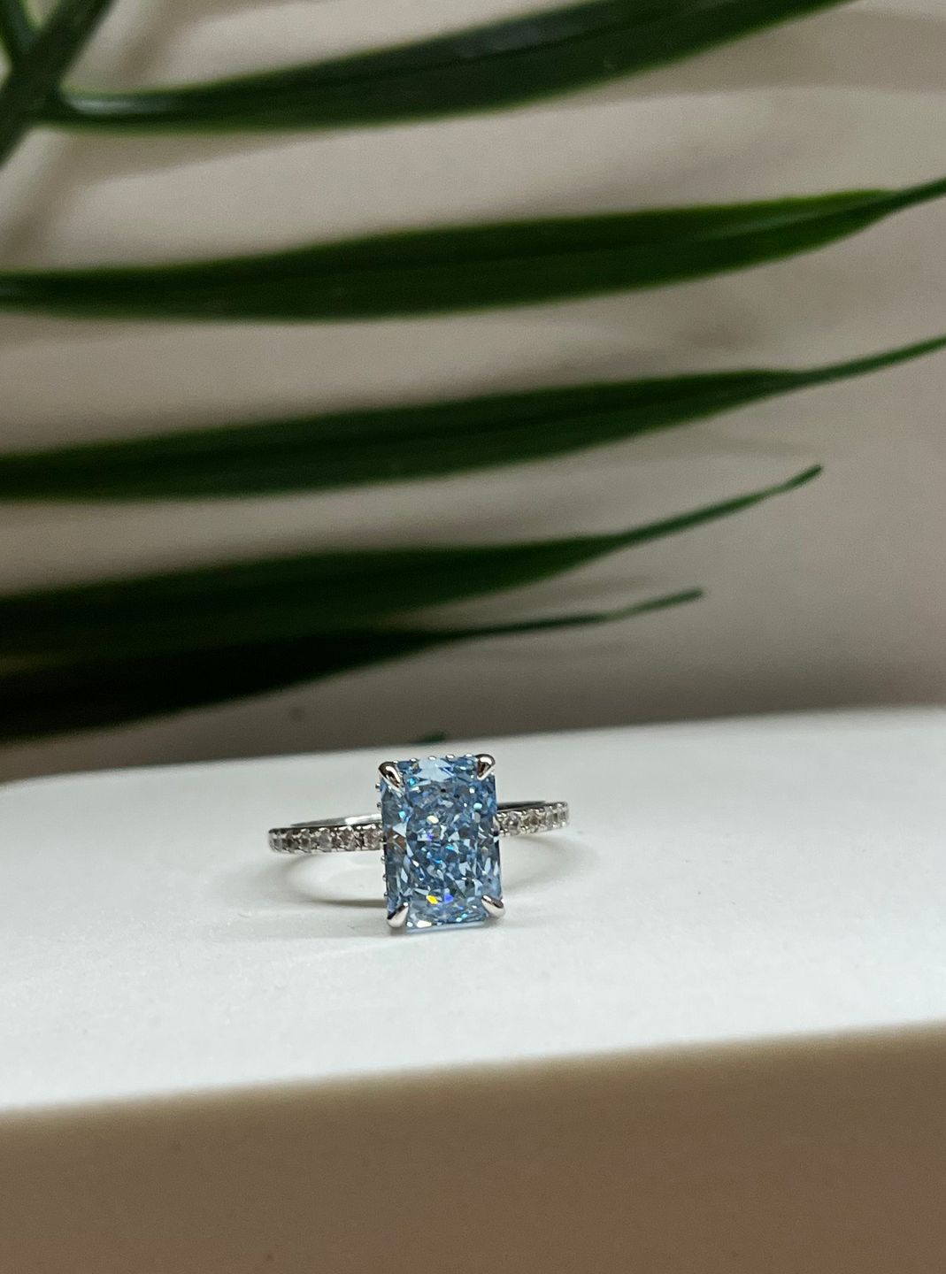 Customer photo review of Louily Exclusive Radiant Cut Light Aquamarine Blue Engagement Ring In Sterling Silver