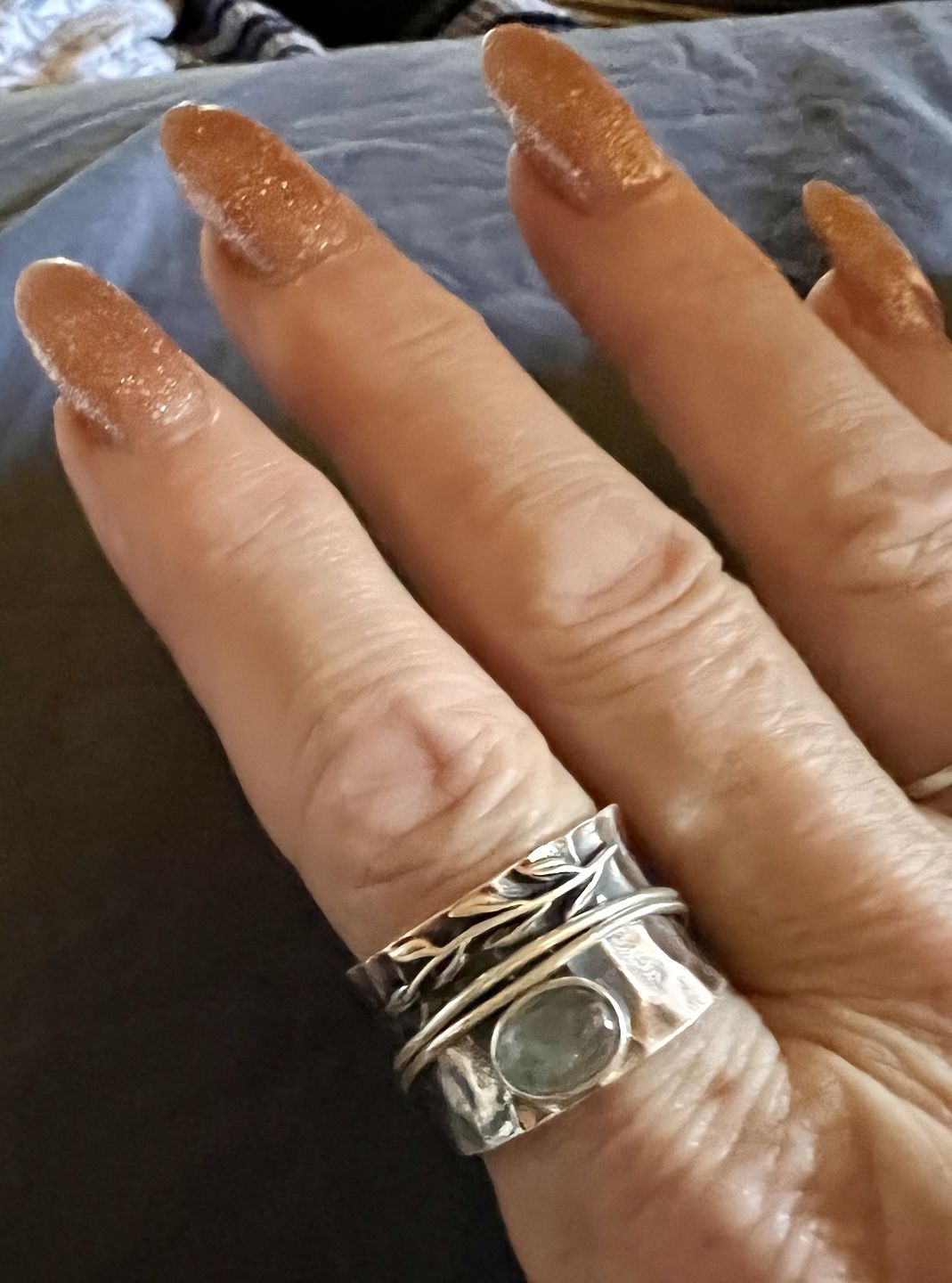 Customer photo review of Aquamarine Leaf Spinner ring Sterling Silver